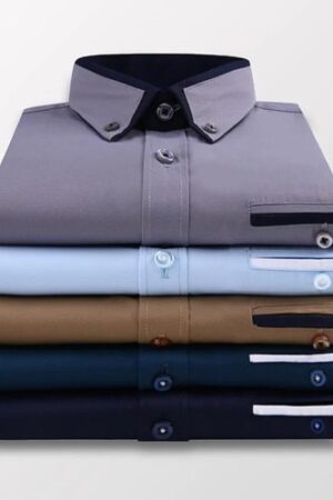 A stack of different colored shirts on top of each other.